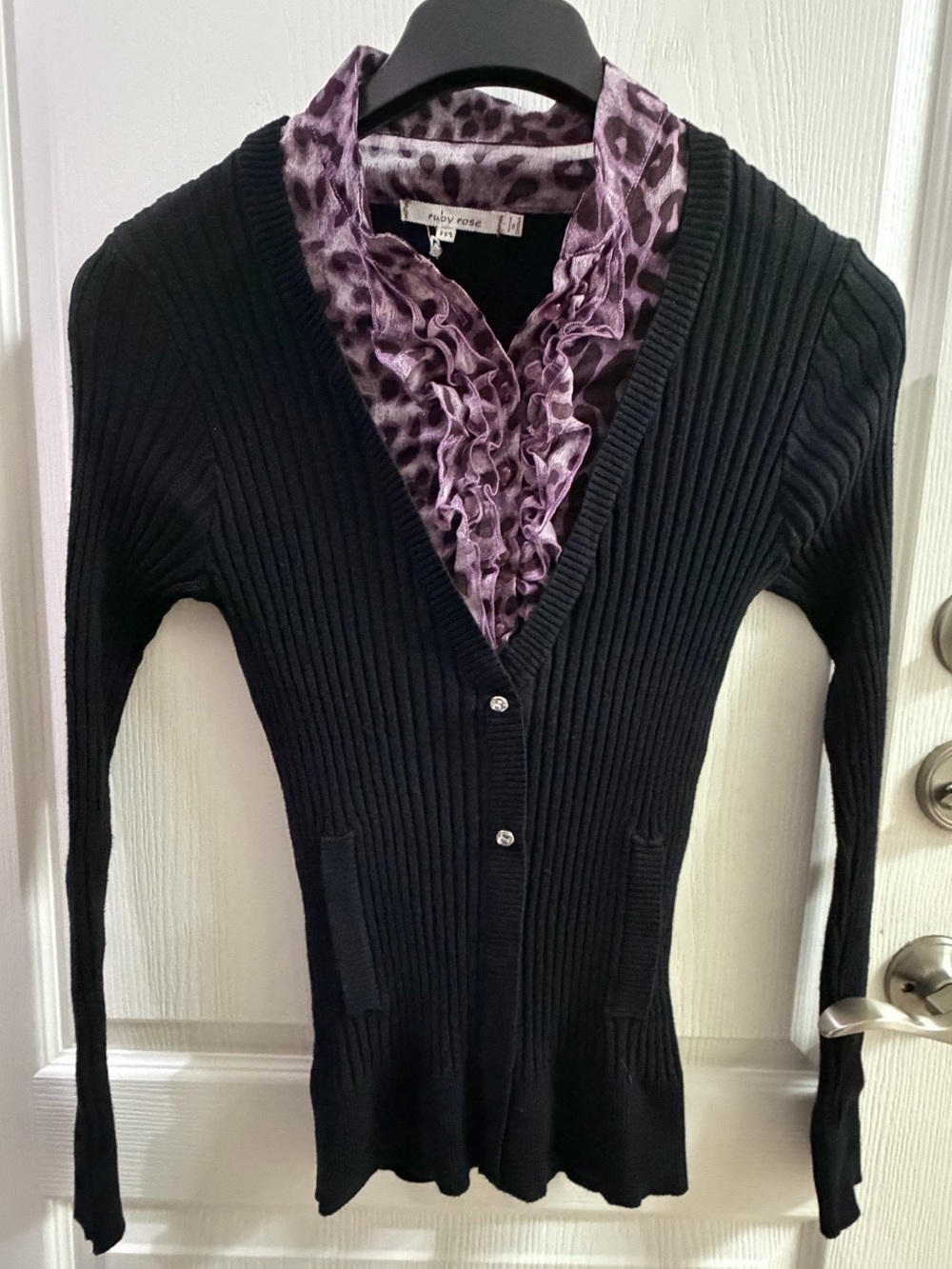 Ruby Rose Black Ribbed V-Neck Sweater with Purple Ruffle Trim